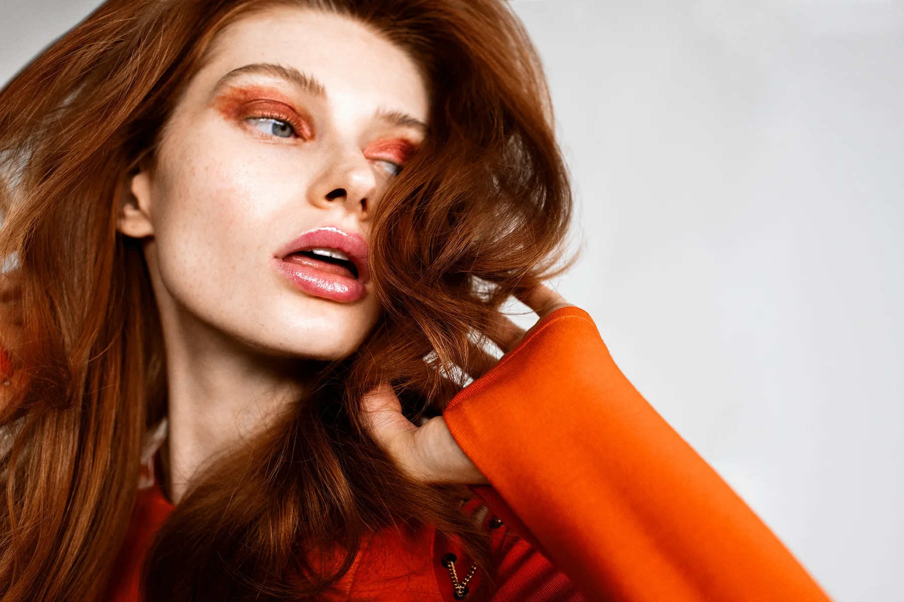 Red hair color and editorial makeup