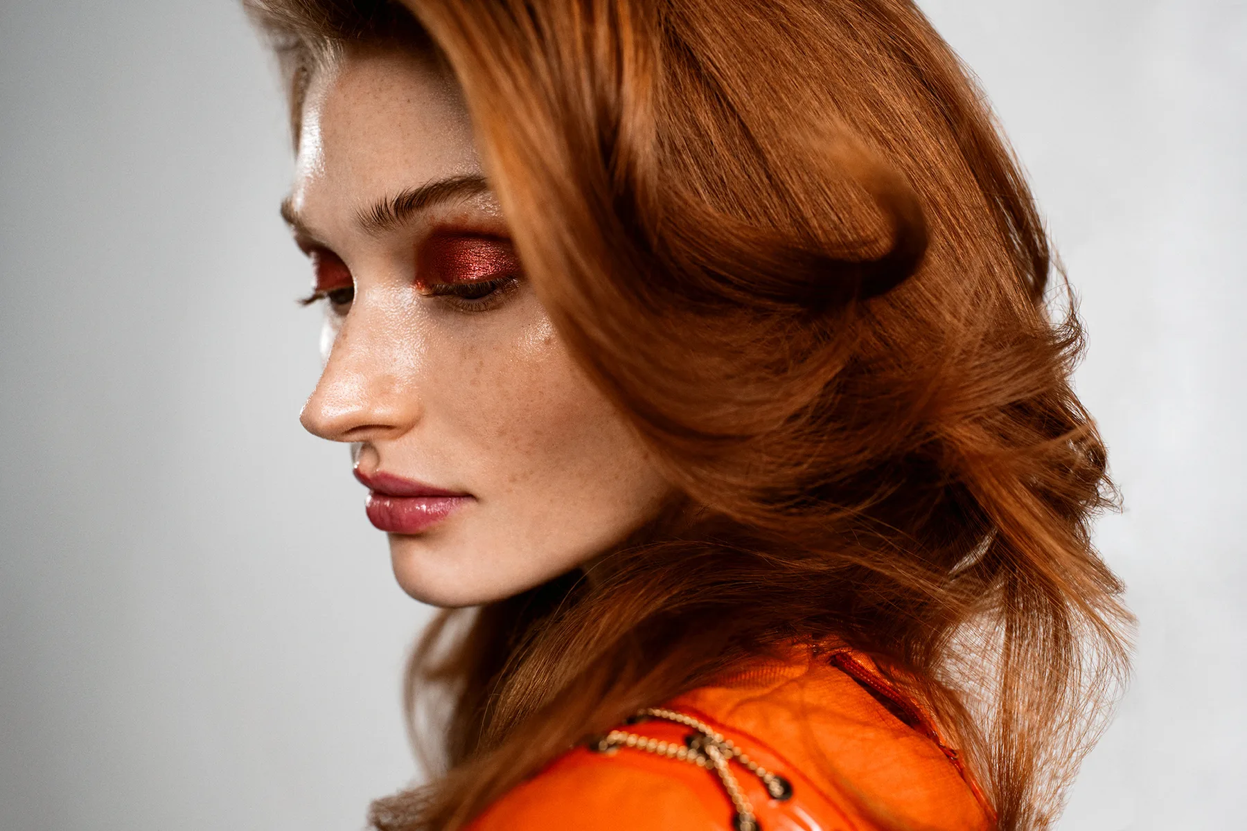 Frankie client with copper hair and editorial makeup